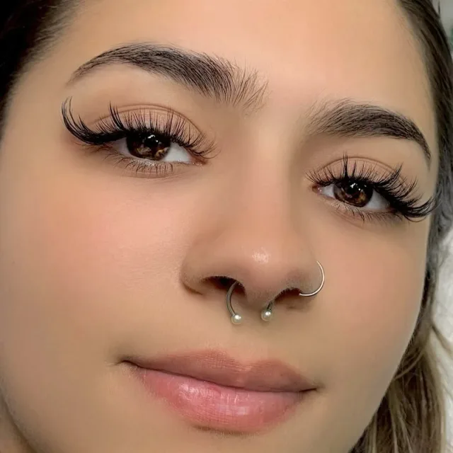 A close look at a client's wispy cat-eye lash set