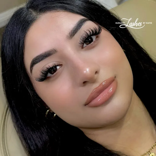 Client showing her finished wispy anime lash set