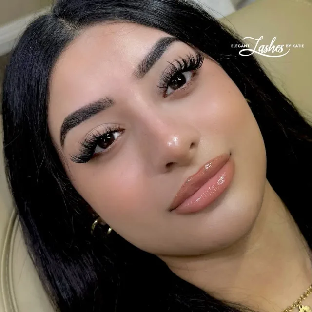 Client wearing a finished lash set by Elegant Lashes By Katie