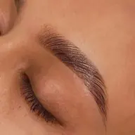 Professional brow lamination and tint Orange County - Eyebrow shaping styling service OC salon